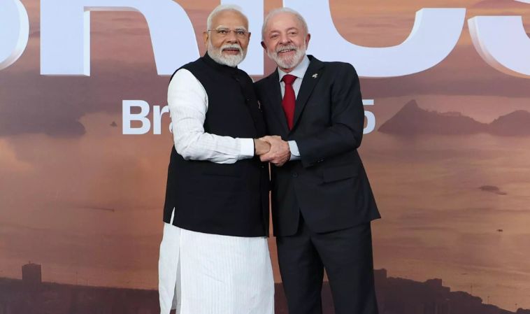 Prime Minister Narendra Modi and Brazilian President Luiz Inácio Lula da Silva shake hands during a diplomatic engagement at the Global South Summit 2025