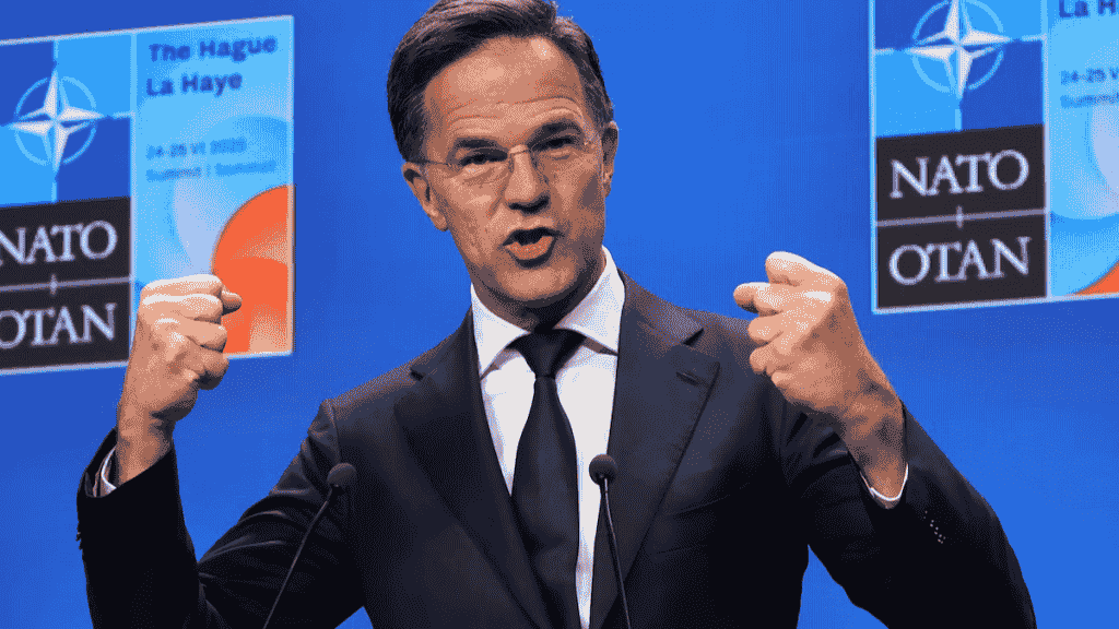 NATO official addresses media at The Hague Summit, emphasizing global stance on Russia trade